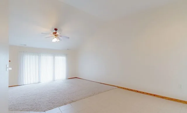 Living room with vaulted ceiling